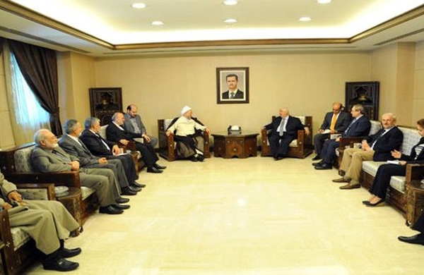 وزير الخارجية السوري يستقبل وفد من علماء الدين في إيران