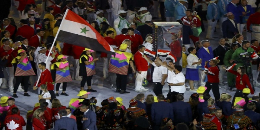 العلم السوري رفرف عالياً  الأولمبيون السوريون حضروا ... والأمل بغزال  