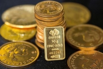 الذهب يتراجع من أعلى مستوى في عام مع صعود الدولار