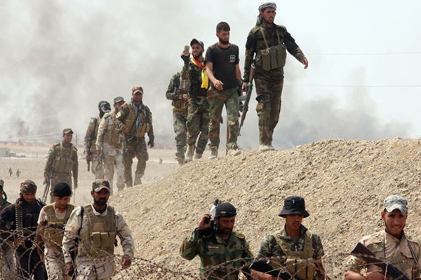ضبط 3 سيارات واعتقال 15 ارهابياً بعد اشتباكات بين قوات عراقية وارهابيون قادمون من سوريا 