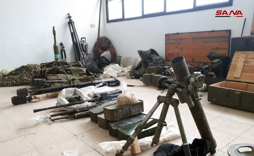أسلحة بينها صواريخ إسرائيلية الصنع من مخلفات الإرهابيين غرب مدينة نوى بدرعا