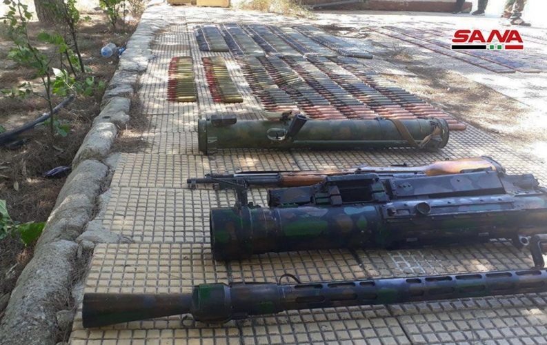 كميات من الأسلحة والذخيرة بينها قنابل إسرائيلية الصنع من مخلفات الإرهابيين في بلدة يلدا بريف دمشق