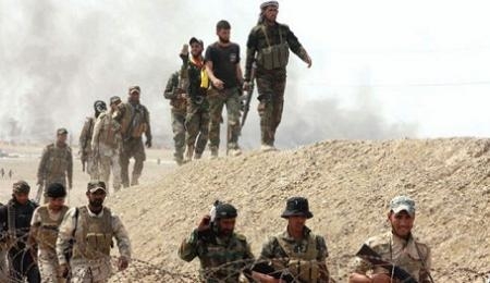  الحشد الشعبي العراقي يعلن إغلاق ثغرات أمنية على الحدود العراقية السورية 