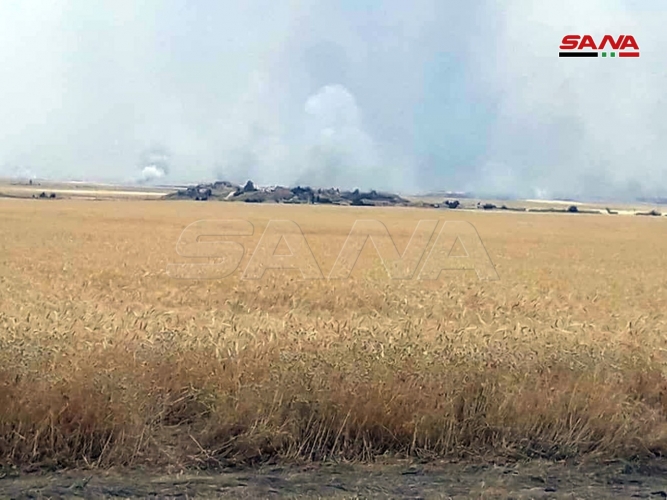 مرتزقة الاحتلال التركي يحرقون مساحات واسعة من الحقول الزراعية بريف الحسكة