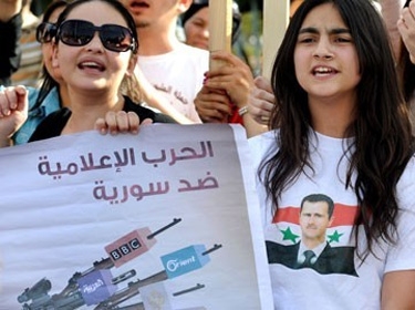 فومين: الإعلام يزور الوقائع في سورية