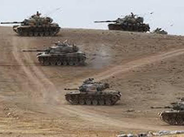 تركيا تنشر دبابات وعربات مدرعة على حدود بلدة عين عرب 