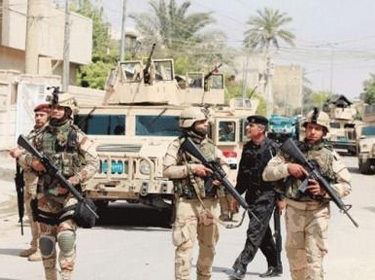 الجيش العراقي يعلن تحرير حي القادسية وسط تكريت من إرهابيي 