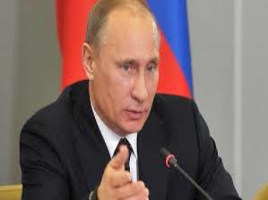 بوتين يعلن ضبط نحو 300 جاسوس في روسيا خلال 2014