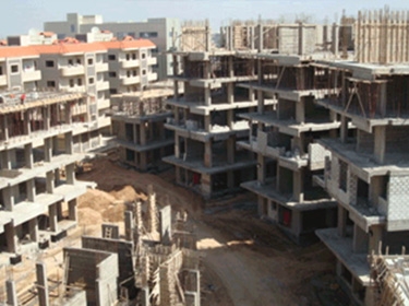 قانون رئاسي بإعفاء الصناعيين والحرفيين من رسوم تجديد رخص البناء