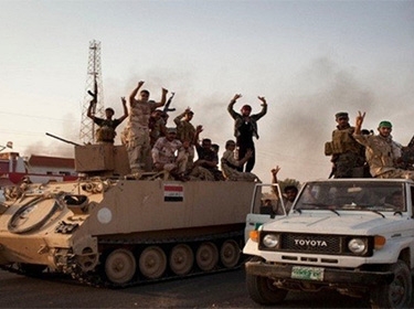 القوات العراقية تدمر مستودعاً للعبوات الناسفة وتحرر قريتين من إرهابيي 