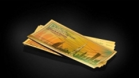 طرح ورقة نقدية من الذهب في دبي