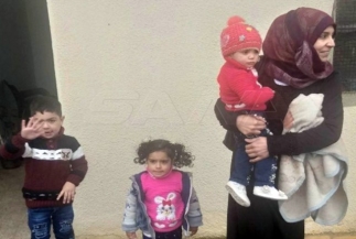 عودة دفعة جديدة من العائلات السورية المهجرة إلى قراها المحررة في حمص