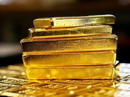 انخفاض طفيف على الذهب رغم ارتفاعه لخمس أسابيع على التوالي