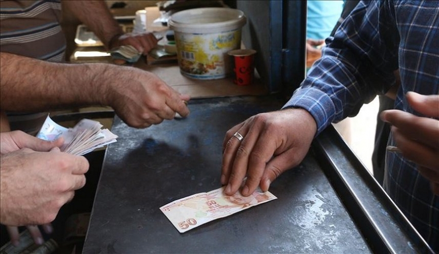 المجموعات الإرهابية تمنع تداول الليرة السوريّة في إدلب