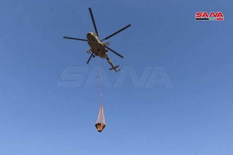 بعد تدخل وحدات الجيش و طائرة ايرانية .. إخماد حريق منطقة عين حلاقيم وحزور