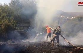 إخماد حريق في قرية عين الخضرا بريف حمص   