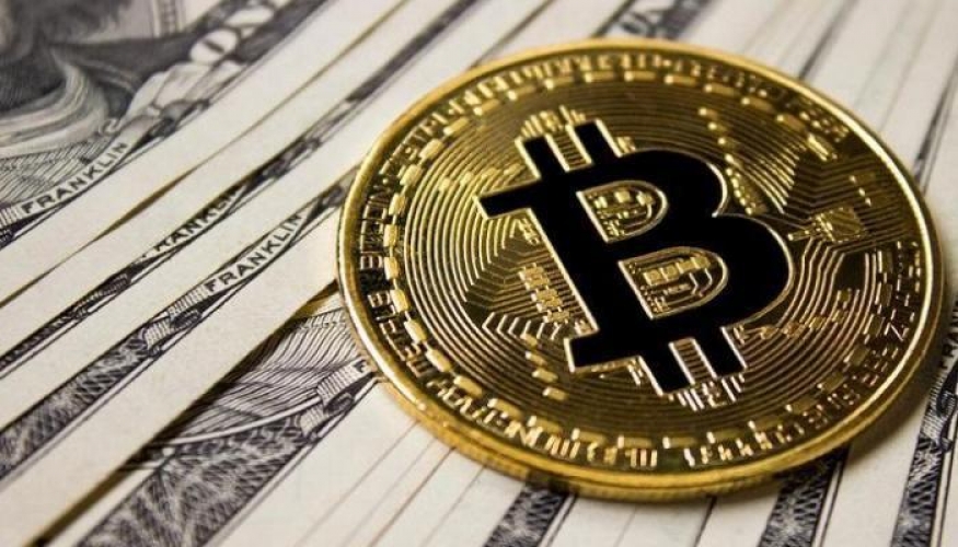 برقم قياسي بيتكوين تقترب من الـ50 ألف دولار