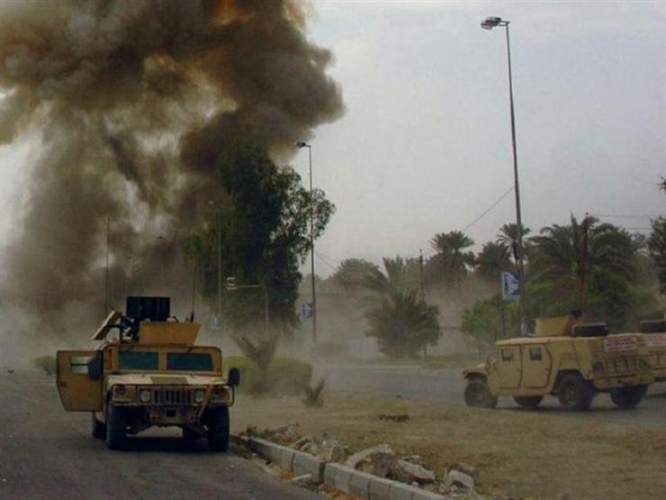العراق .. إنفجار عبوة ناسفة برتل للتحالف الأمريكي