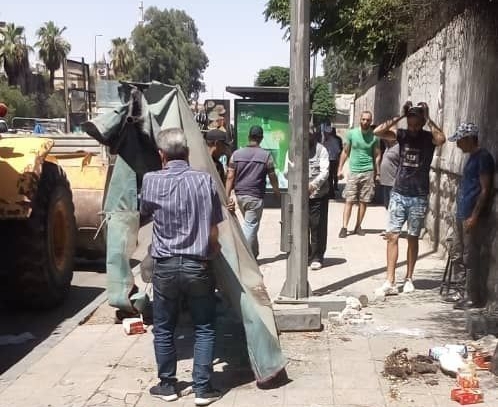 إزالة الإشغالات المخالفة وتكثيف حملات رش المبيدات الحشرية مستمرة في دمشق