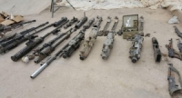  الجهات المختصة تعثر على أسلحة وذخيرة من مخلفات إرهابيي “داعش” في ريف دير الزور