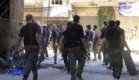  إدلب, عشرات المسلحين و القادة يلقون السلاح و يتوجهون الى مواقع الجيش السوري
