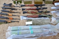 أسلحة وذخيرة بينها صواريخ أمريكية من مخلفات الإرهابيين في مزارع ببيلا بريف دمشق