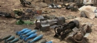 كميات كبيرة من الأسلحة والذخيرة من مخلفات الإرهابيين بريف حمص الشمالي