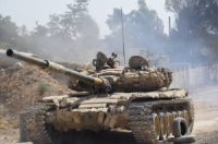 بالفيديو براعة الجندي السوري ... مواجهة بين دبابة سورية و صاروخ تاو امريكي