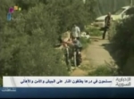 التلفزيون السوري يلتقط صور لمجموعة مسلحة تطلق النار على الأهالي وقوى الأمن في درعا اليوم