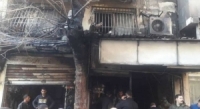 وفاة طفل وإصابة والده بحروق خطيرة جراء نشوب حريق في أحد المحلات التجارية بدمشق
