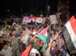 السوريون واللبنانيون يملؤون شوارع بيروت احتفالاً بانتخاب الرئيس الأسد